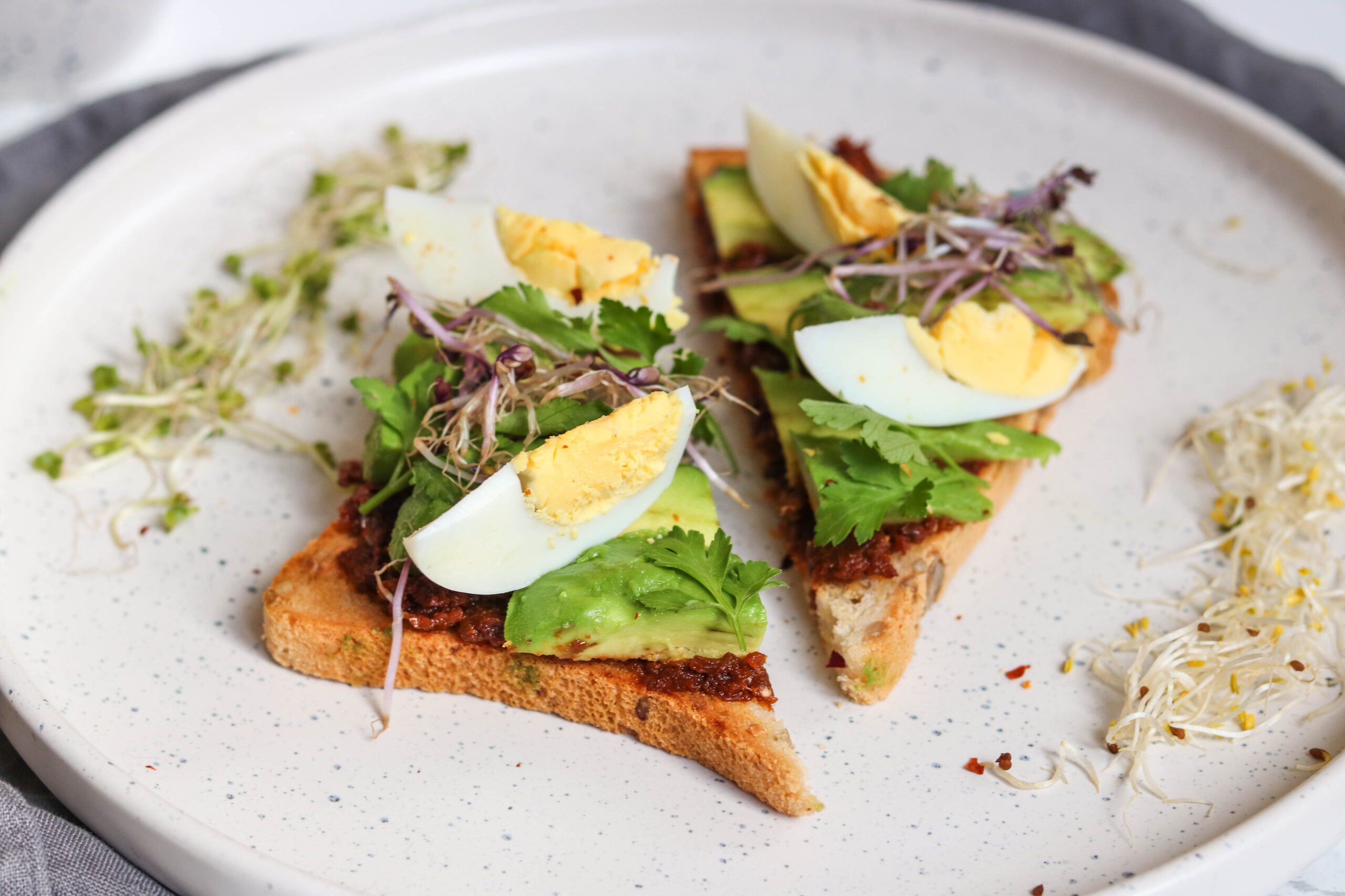 AVOCADO, TAPENADE & EGG TOAST